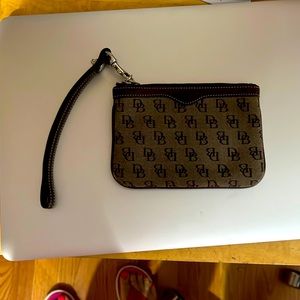 Dooney & Bourque classic brown wristlet in great condition. High quality